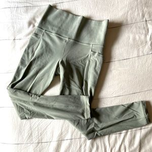 COPY - Athleta salutation stash pocket 7/8 legging